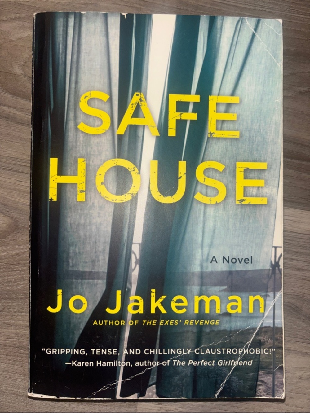 Safe House by Jo Jakeman - Yellow & Teal Paperback Novel